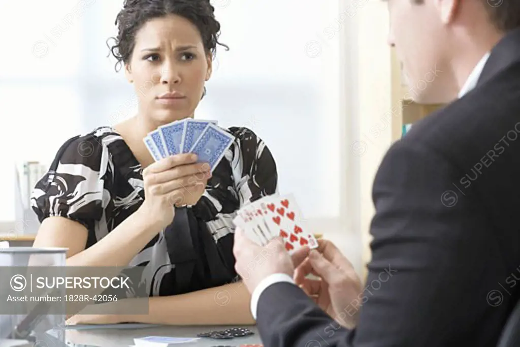 Business People Playing Poker   