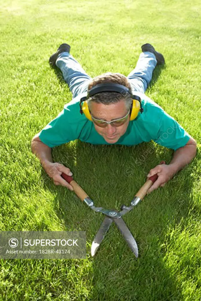Man Cutting Grass   