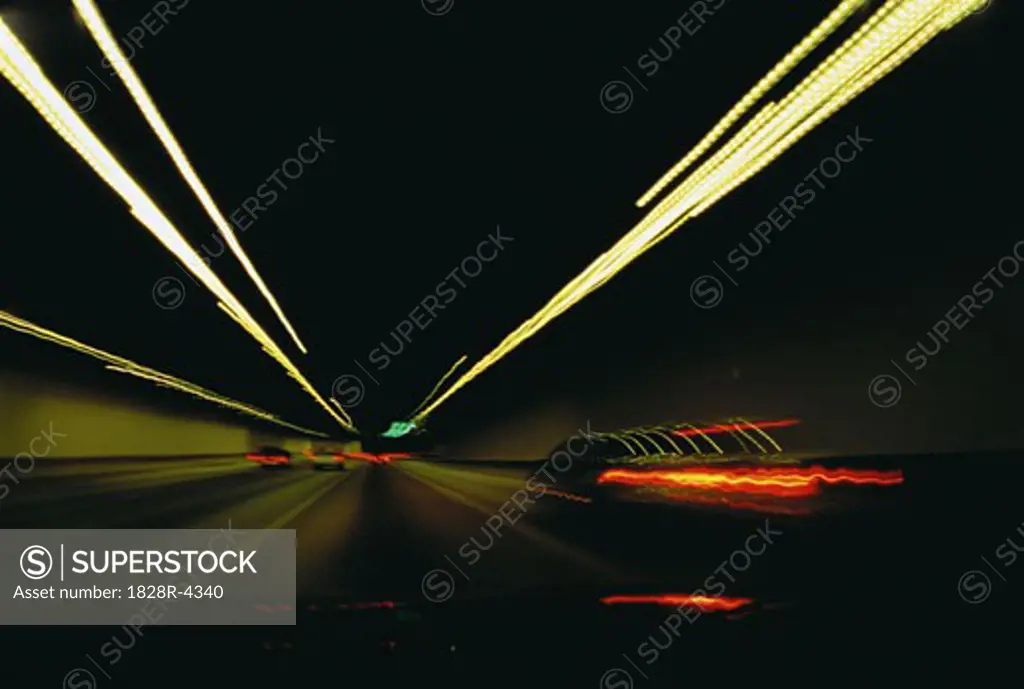 Cars and Light Trails in Tunnel   