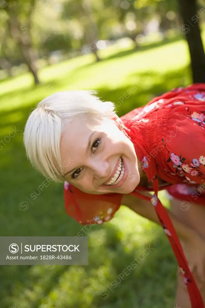 Portrait of Happy Woman in Park   