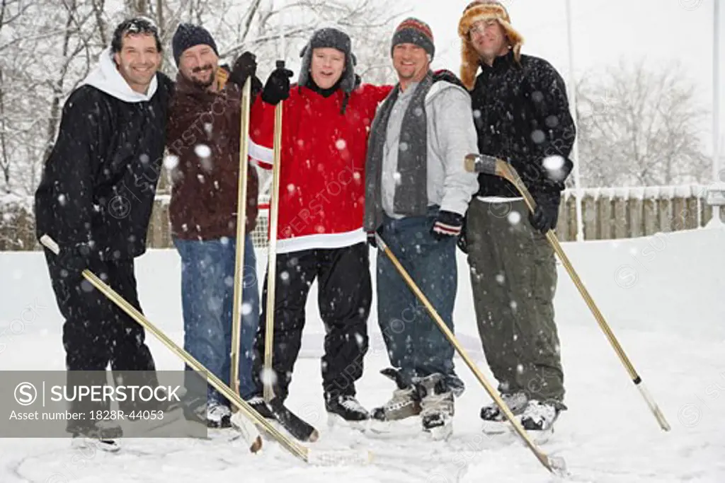 Portrait of Men with Hockey Sticks   
