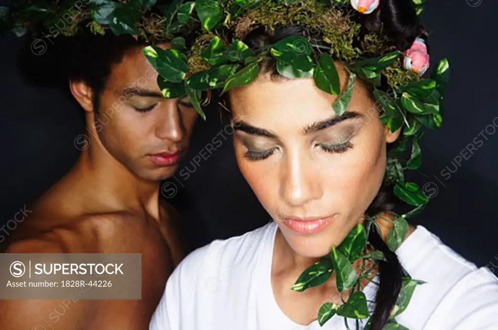 Portrait of Couple With Wreaths in Hair   
