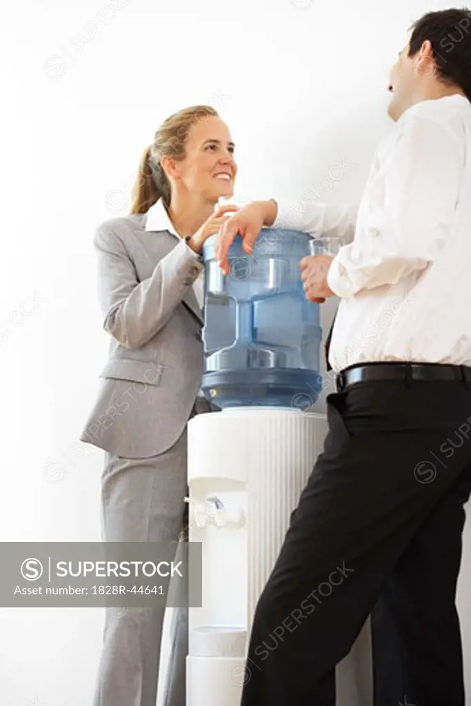 Business People Talking at the Water Cooler   