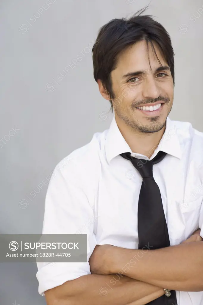 Portrait of Businessman with Arms Crossed   