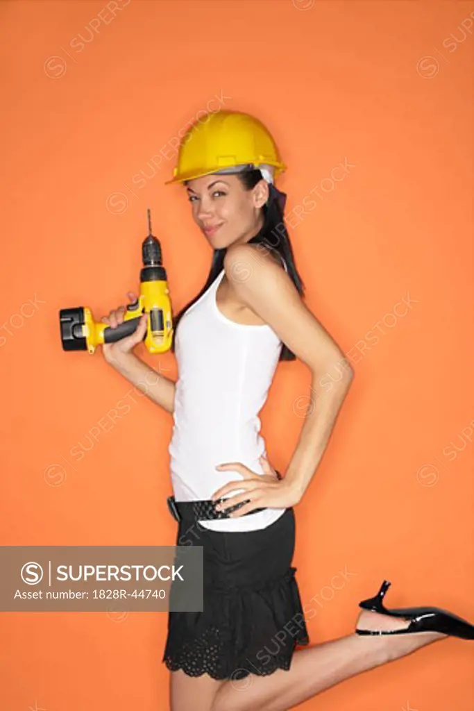 Woman Holding Power Drill   