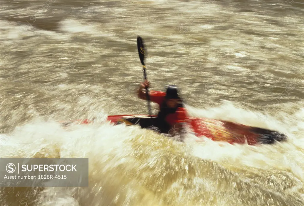 Blurred Person Kayaking, Ococee River, North Carolina, USA   