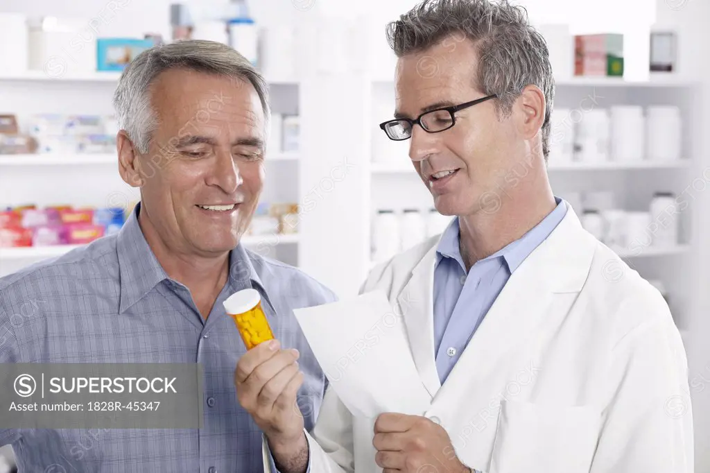 Pharmacist Talking to Client   