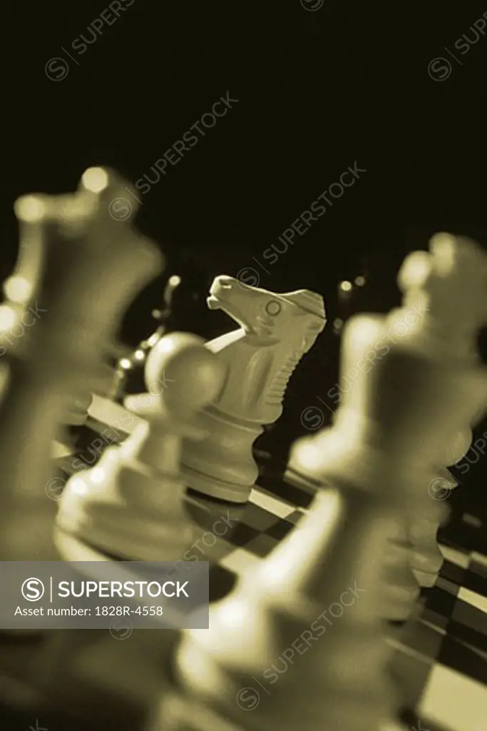 Close-Up of Chess Pieces on Chess Board   