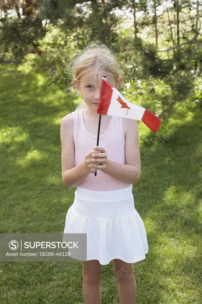 Portrait of Little Girl Holding Canadian Flag, Elmvale, Ontario, Canada   
