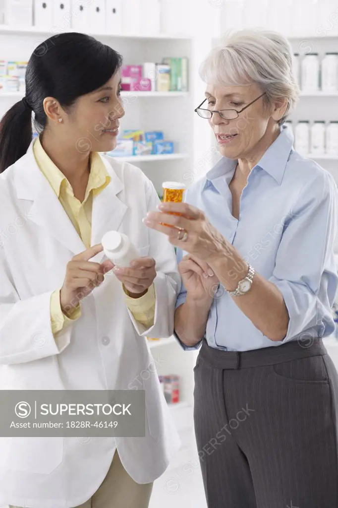 Pharmacist Talking to Client   