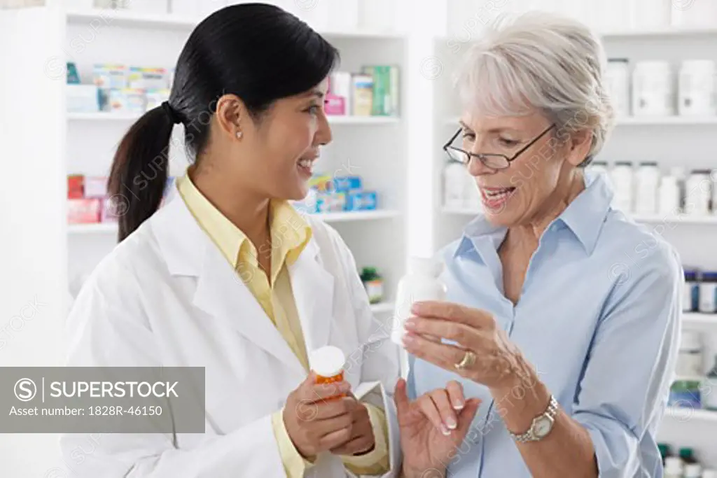 Pharmacist Talking to Client   