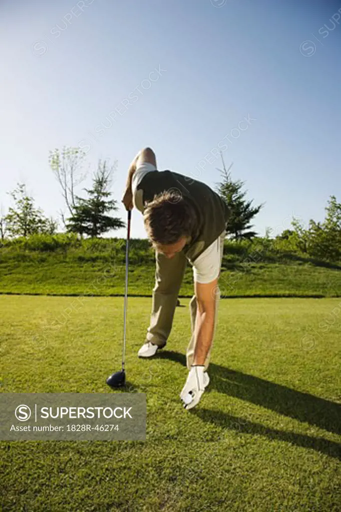 Man Golfing   