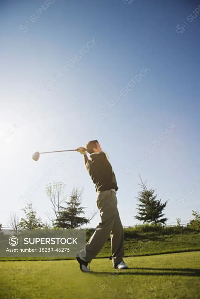 Man Golfing   