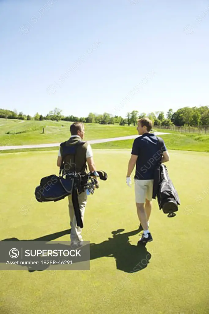 Golfers on Putting Green   