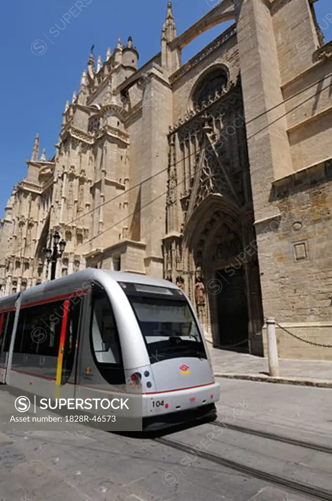 Tram by Cathedral, Seville, Spain   