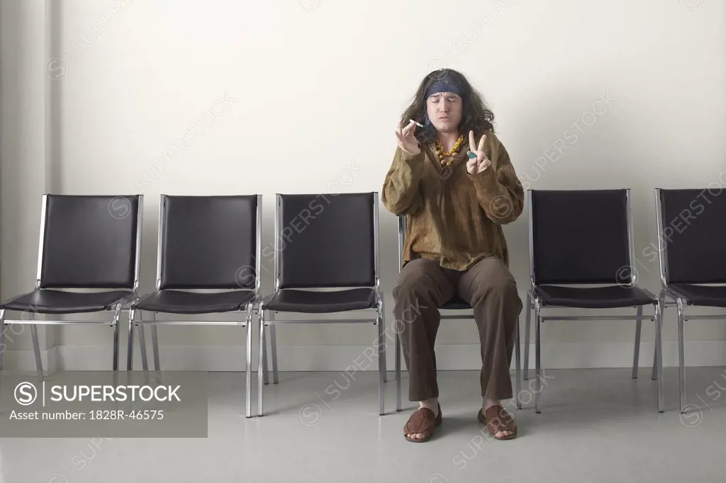 Hippie in Waiting Room Smoking Marijuana   