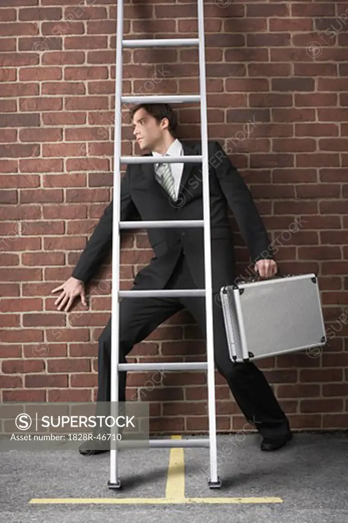 Businessman Walking Under Ladder   