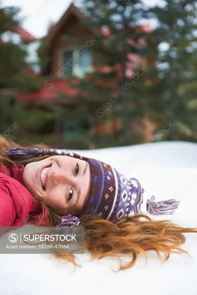 Woman Lying in Snow, Government Camp, Oregon, USA   