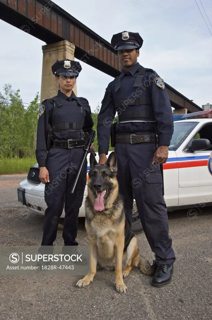 Portrait of Police Officers With Police Dog   