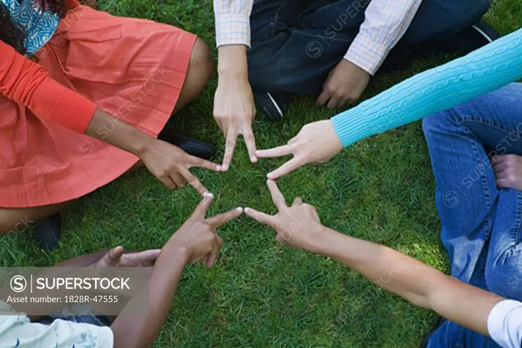 Group of Teens Making a Star   