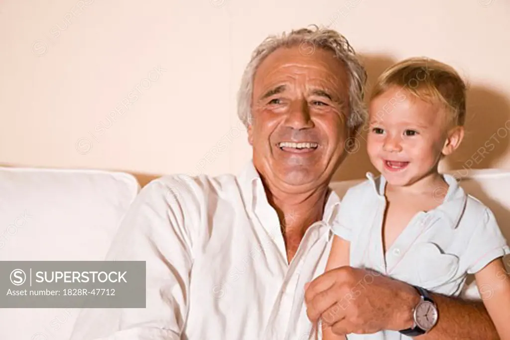 Little Boy and Grandpa Watching Television   