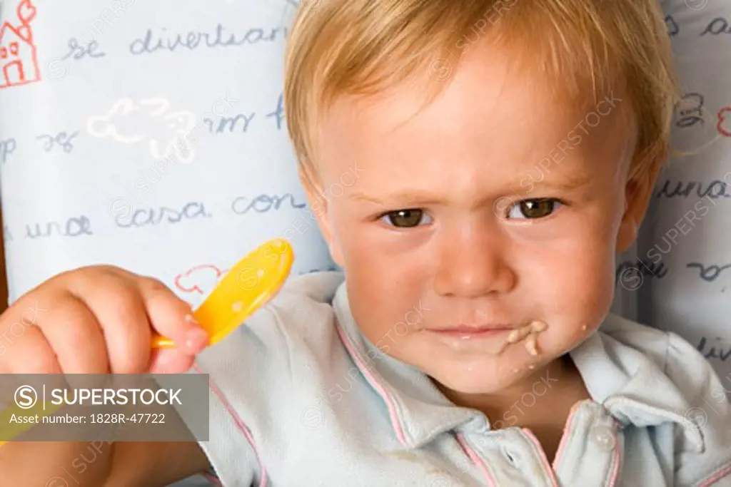Portrait of Little Boy Eating   