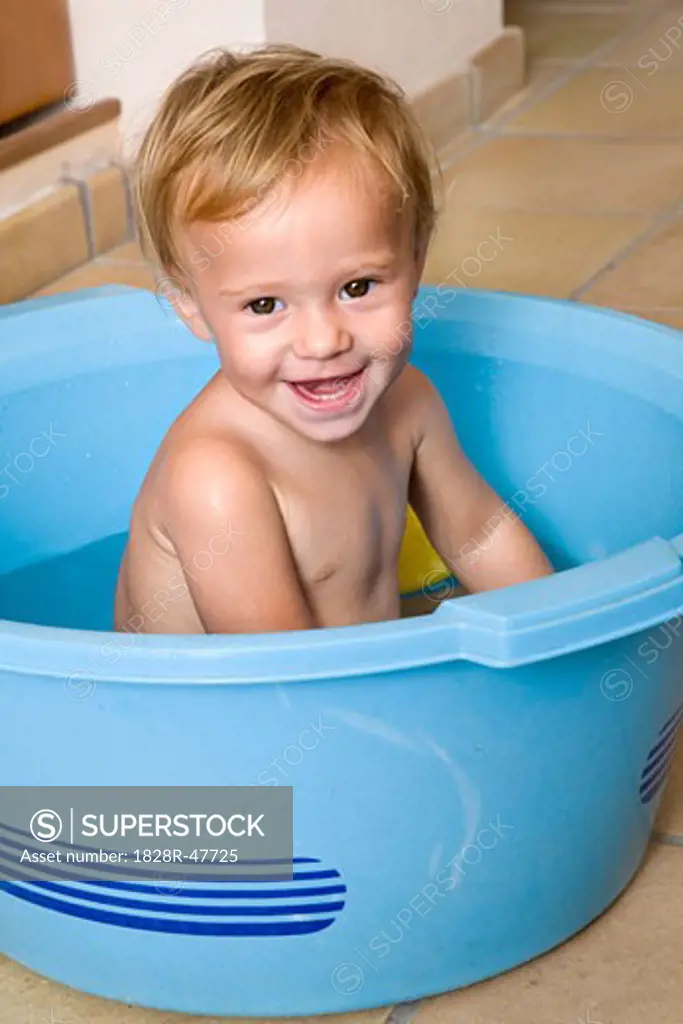 Little Boy in Plastic Tub   