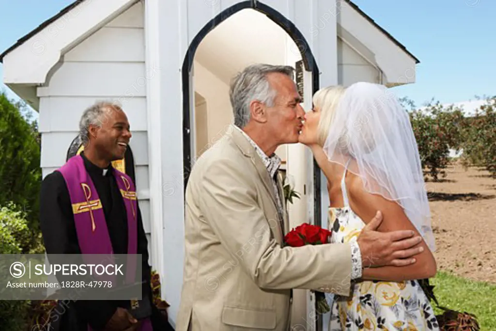 Bride and Bridegroom Kissing   