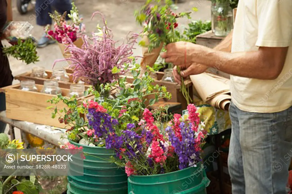 Flower Vendor Selling Flowers at Organic Farmer's market