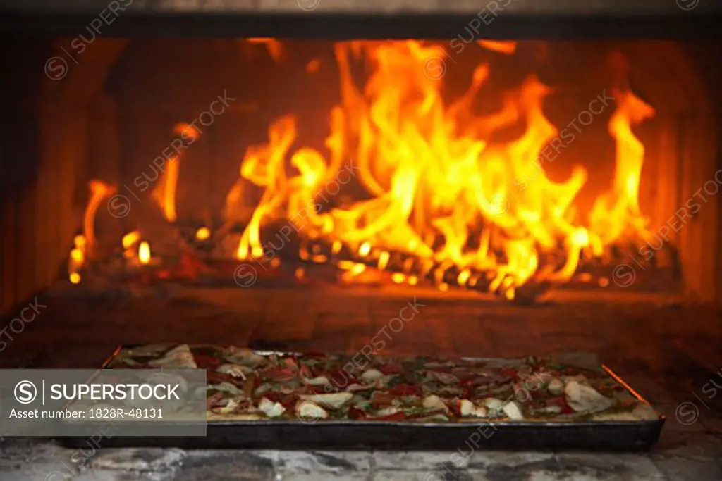 Pizza Cooking in Outdoor Pizza Oven   
