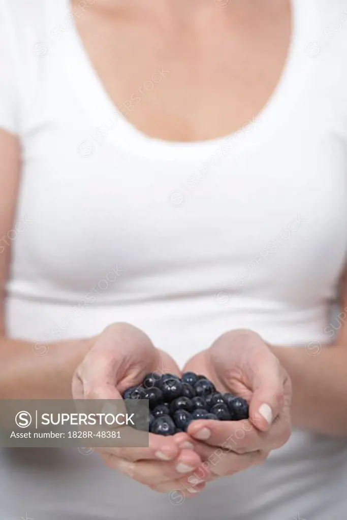 Woman Holding Fruit