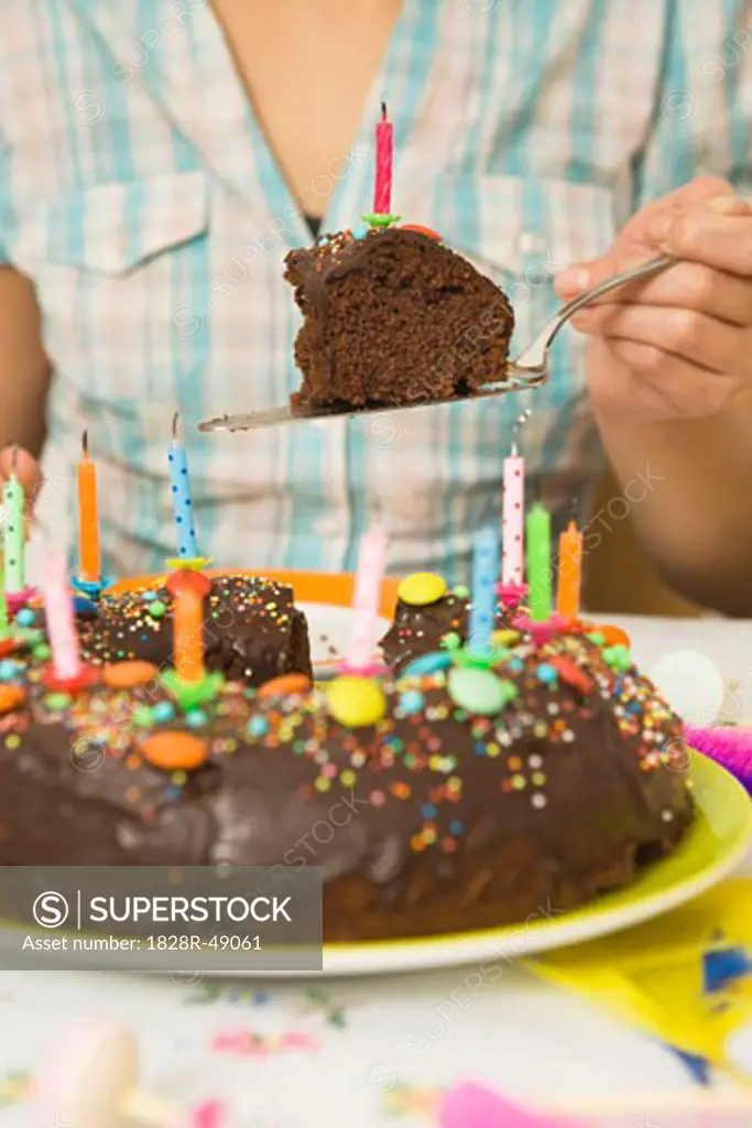 Woman Eating Birthday Cake   