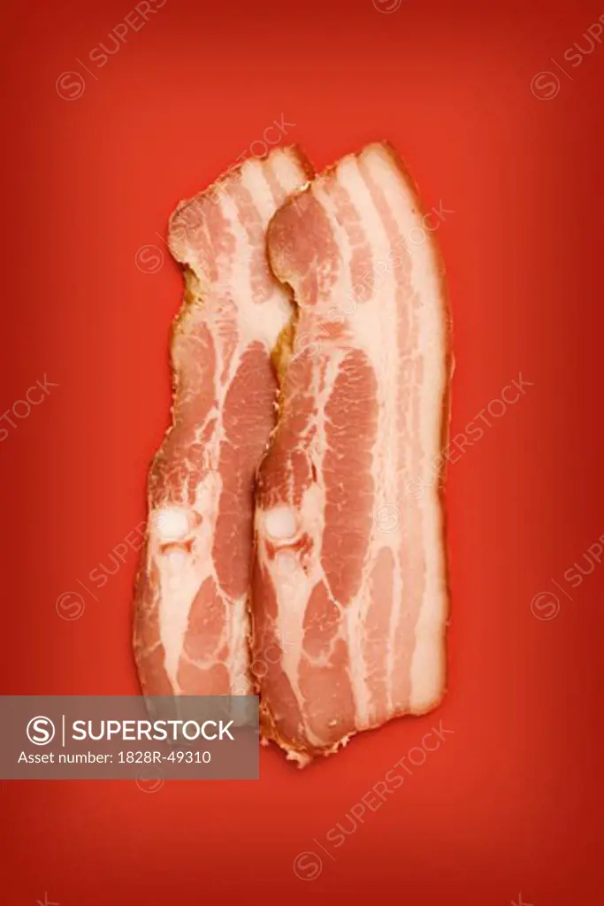 Still Life of Two slices of Uncooked Bacon   