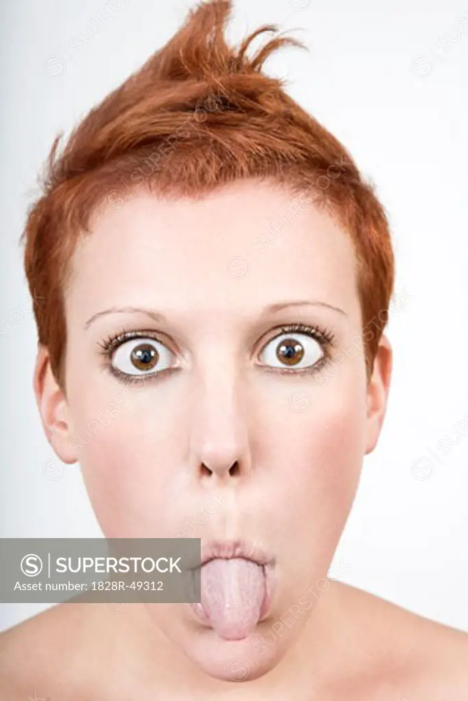 Portrait of Woman Sticking Out Her Tongue   