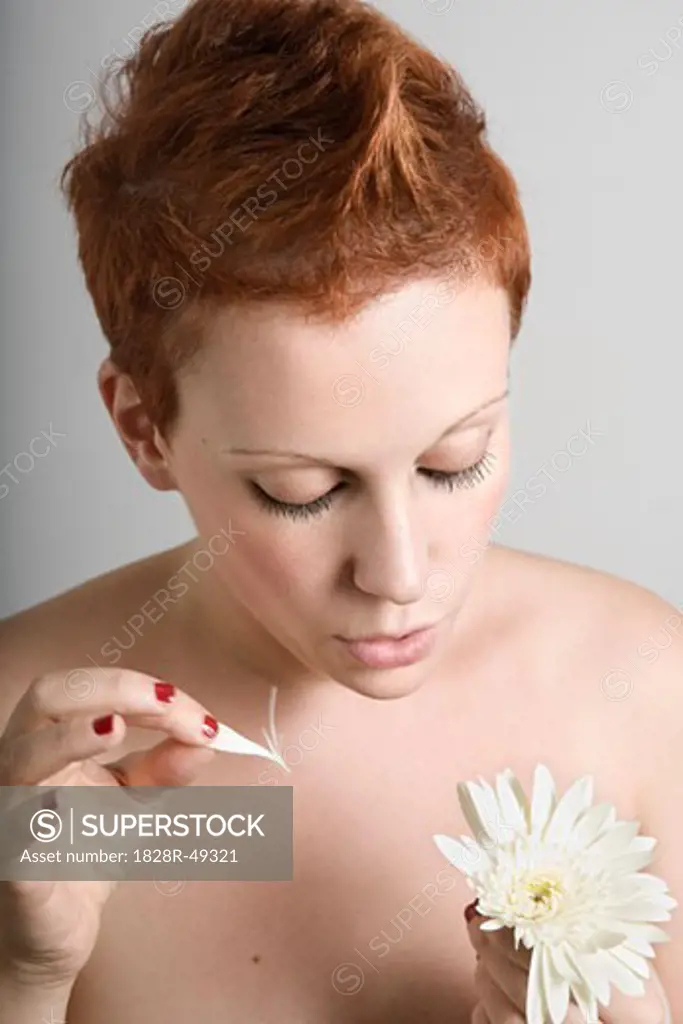 Portrait of Woman Plucking a Flower   