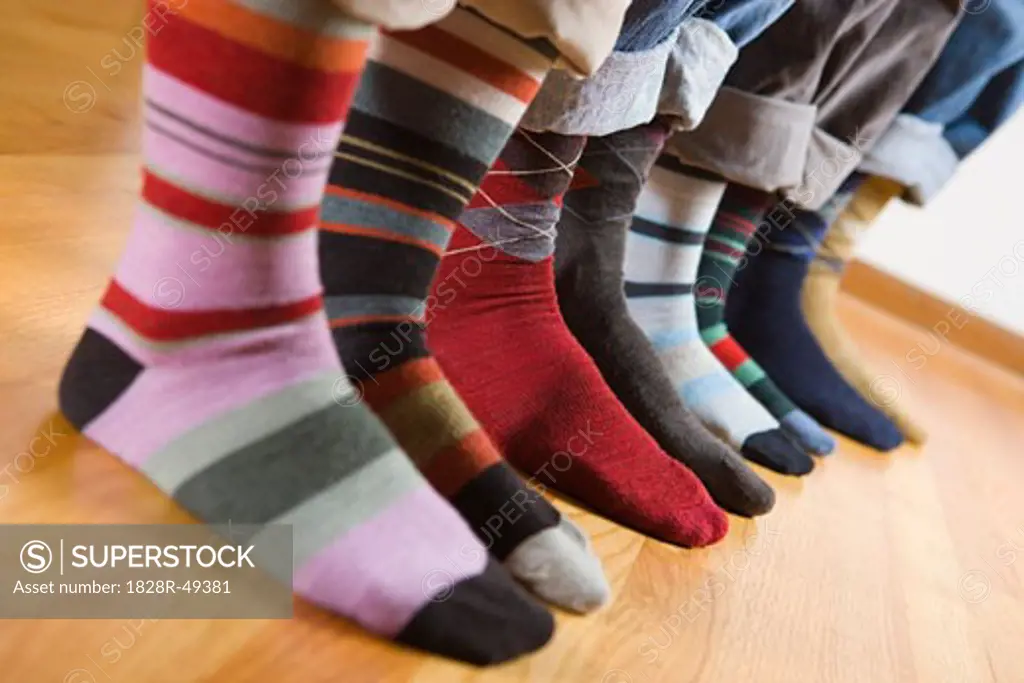Close-up of People Wearing Colourful Socks   