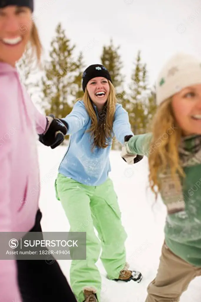 Group of Women Playing in the Snow, Near Frisco, Summit County, Colorado, USA   