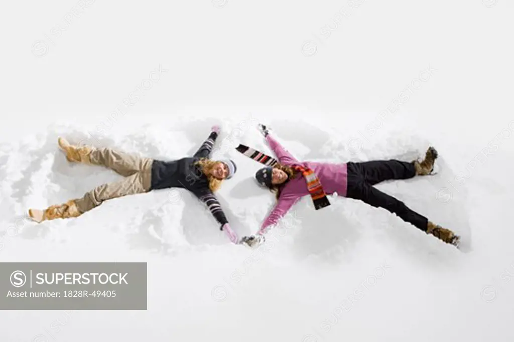 Women Making Snow Angels, Near Frisco,  Summit County, Colorado, USA   