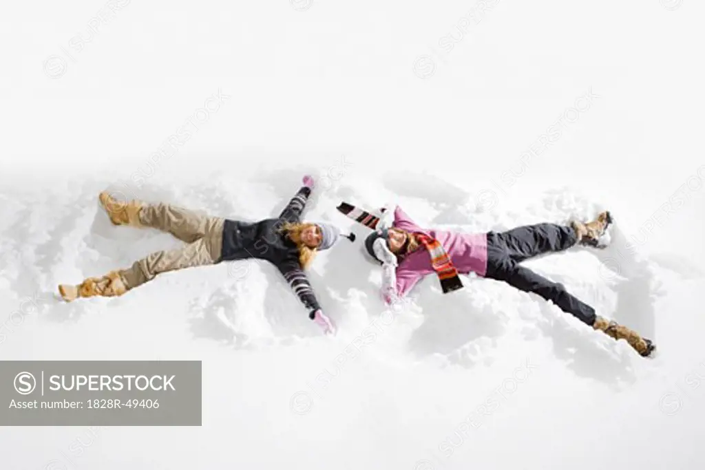 Women Making Snow Angels, Near Frisco,  Summit County, Colorado, USA   