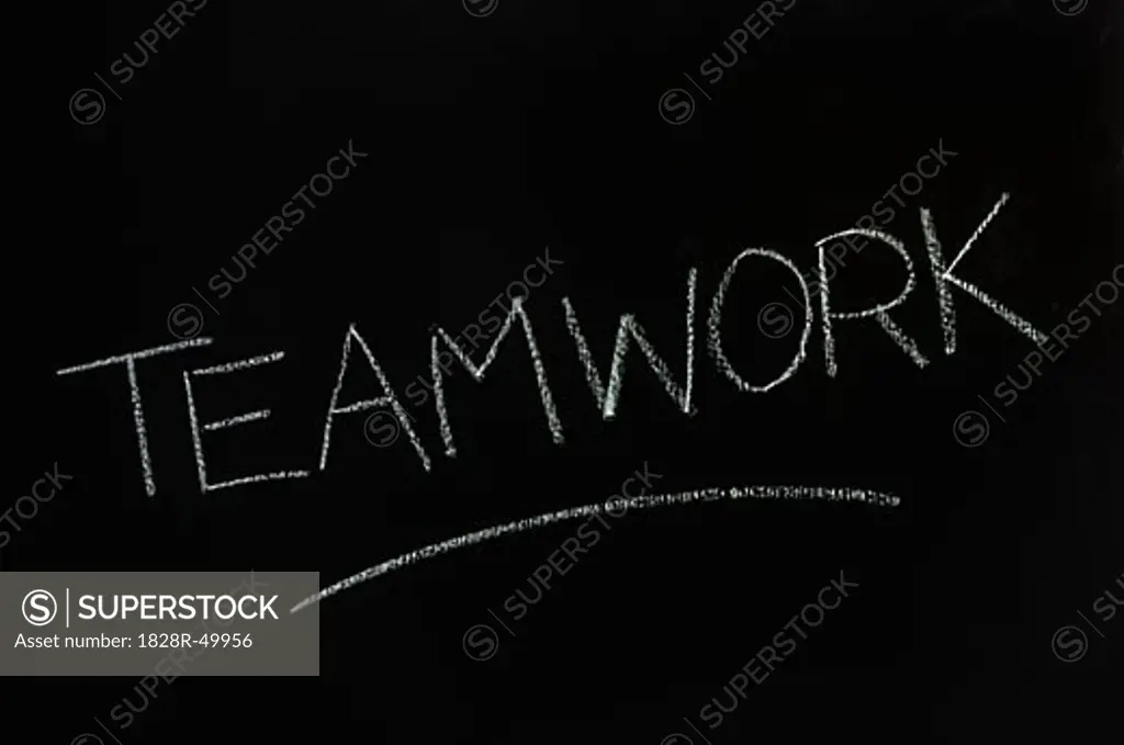 Teamwork Written on Chalkboard   