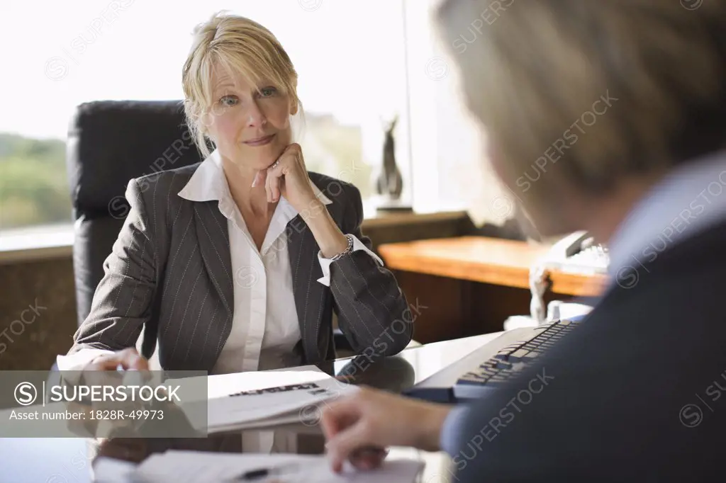 Businesswoman Meeting with Coworker   