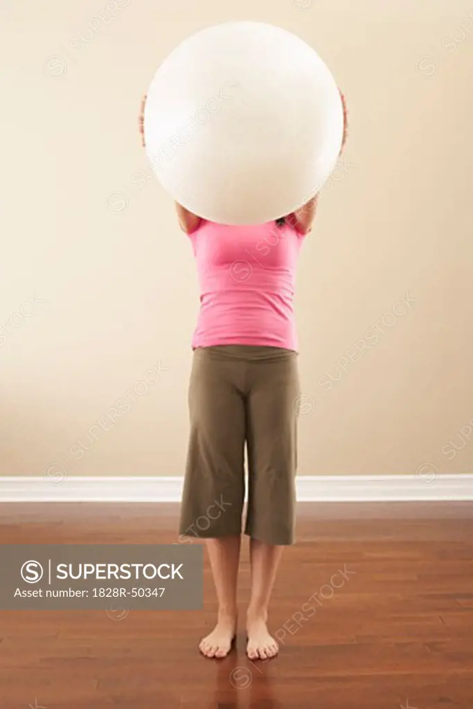 Portrait of Woman With Exercise Ball   