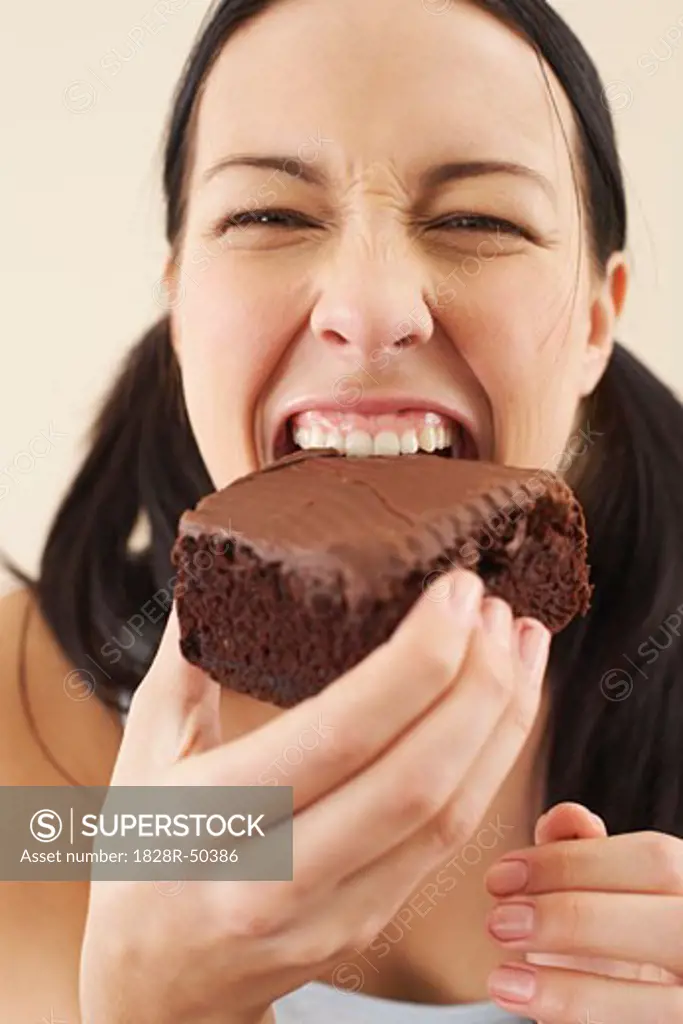 Woman Eating Brownie   