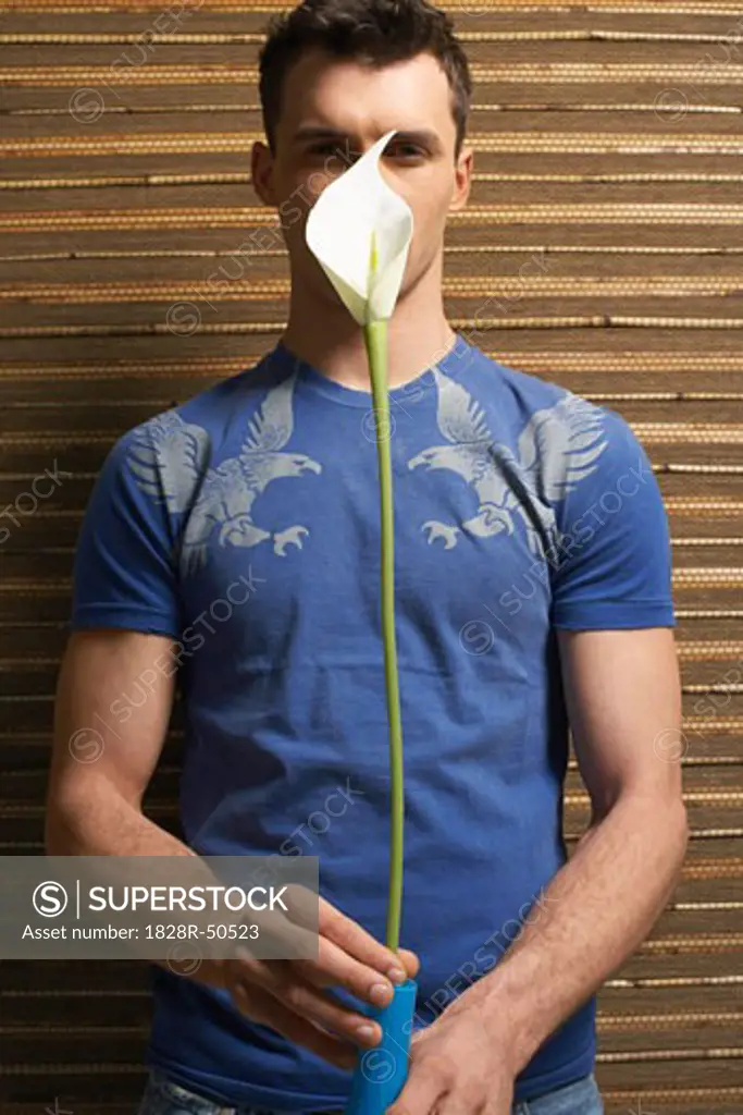 Man Holding Flower and Vase   