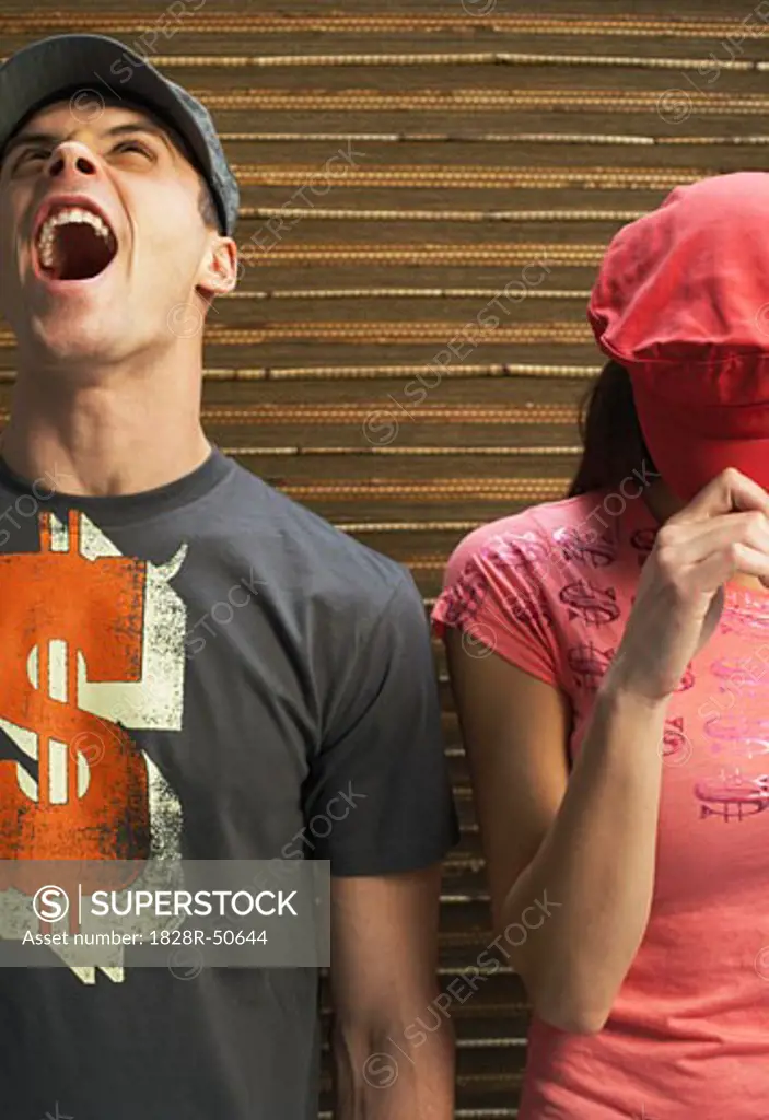 Man Yelling and Woman Covering Face   