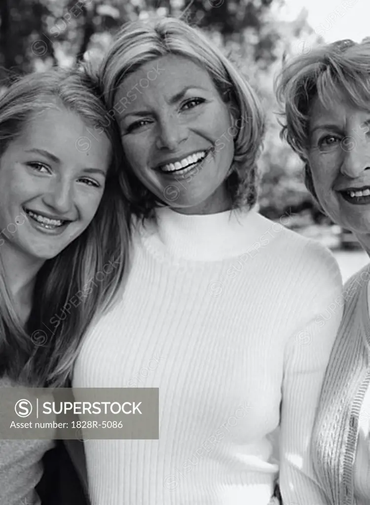 Portrait of Grandmother, Mother And Daughter Outdoors   