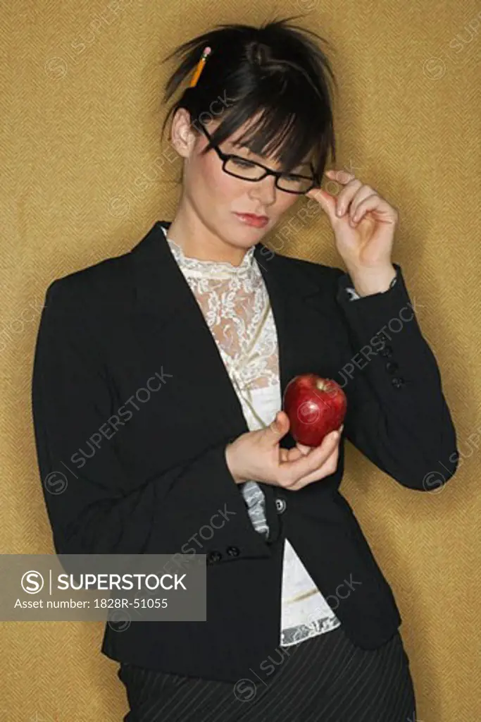 Portrait of Woman Holding an Apple   