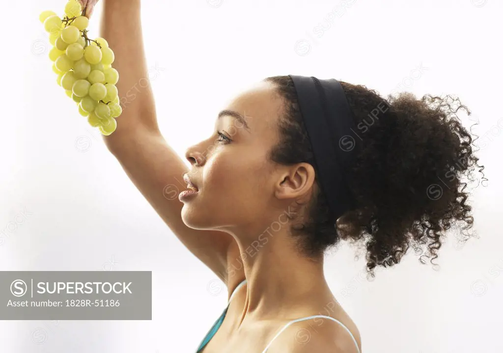 Woman Holding Grapes   