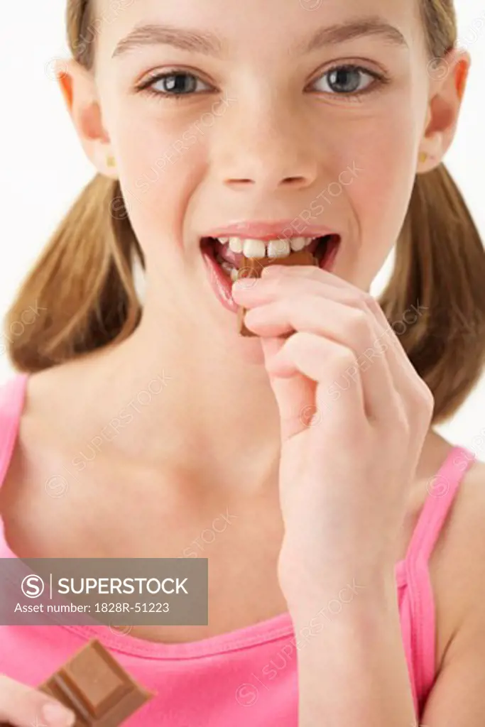 Girl Eating Chocolate   