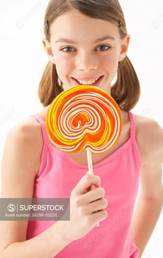Girl Holding large Lollipop   